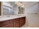 Bathroom with double sinks, marble countertop, and vanity cabinet at 5239 Tartan Hill Ave, Las Vegas, NV 89141