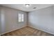 Bedroom with window and neutral carpet at 5239 Tartan Hill Ave, Las Vegas, NV 89141