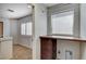 Laundry room with front loading hookups, folding counter, and window at 5239 Tartan Hill Ave, Las Vegas, NV 89141