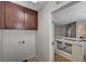 Laundry room with overhead cabinets and hookups at 5239 Tartan Hill Ave, Las Vegas, NV 89141