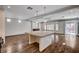 Open concept space combines the kitchen and living areas, perfect for entertaining at 5239 Tartan Hill Ave, Las Vegas, NV 89141
