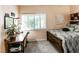 This charming bedroom is bathed in natural light and showcases attractive wooden accents at 53 Grossinger Ct, Henderson, NV 89074