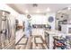 Modern kitchen with stainless steel appliances, granite countertops, and ample storage at 53 Grossinger Ct, Henderson, NV 89074