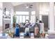 Open concept living space with natural light, fireplace, and modern decorations at 53 Grossinger Ct, Henderson, NV 89074