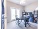 Bright office space featuring a ceiling fan and a pair of french doors to the outside at 53 Grossinger Ct, Henderson, NV 89074