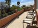 Sun-soaked patio with comfortable seating and an unobstructed neighborhood view at 530 Calahonda Ct, Las Vegas, NV 89138