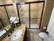 Bathroom with a single sink, shower, decorative marble counter, and toilet at 530 Calahonda Ct, Las Vegas, NV 89138