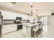 Modern kitchen boasts sleek countertops, stainless steel appliances, and ample cabinet space at 5920 Big Horn View St, North Las Vegas, NV 89031