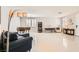 Bright and spacious living room with tile flooring and an abundance of natural light at 5920 Big Horn View St, North Las Vegas, NV 89031