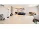Open-concept living room with tile flooring, perfect for entertaining at 5920 Big Horn View St, North Las Vegas, NV 89031