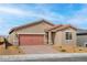 Attractive single-level home with a brick driveway, two-car garage, and low-maintenance landscaping at 6737 Lotus Vista Ct, Las Vegas, NV 89156