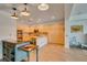 Spacious kitchen with light wood cabinets, stainless steel appliances, and recessed lighting at 7349 Royal Melbourne Dr, Las Vegas, NV 89131