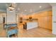 Well-lit kitchen featuring custom cabinetry, modern appliances, and ample counter space at 7349 Royal Melbourne Dr, Las Vegas, NV 89131