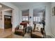 Inviting living room area showcasing stylish seating and an open floor plan at 7349 Royal Melbourne Dr, Las Vegas, NV 89131