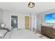 Bright bedroom with luxury en suite bath and TV, providing a tranquil and relaxing retreat at 7566 Hope Valley St, Las Vegas, NV 89139
