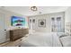 Bedroom features a large TV, neutral decor, and natural light, creating a comfortable personal space at 7566 Hope Valley St, Las Vegas, NV 89139