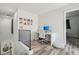 Bright and modern office space with a white desk, chair, and minimalist decor at 7566 Hope Valley St, Las Vegas, NV 89139