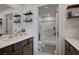 Double vanity bathroom leading to shower at 759 Pickled Pepper Pl, Henderson, NV 89011