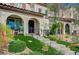 Charming townhome featuring an arched entrance, and stone stairway at 759 Pickled Pepper Pl, Henderson, NV 89011