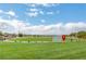 Picturesque view of a community park featuring walking paths and green spaces at 759 Pickled Pepper Pl, Henderson, NV 89011