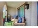 Inviting patio with comfortable seating, decorative pillows, and stylish decor at 759 Pickled Pepper Pl, Henderson, NV 89011