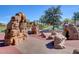 Community playground featuring rock structures, climbing features and slides for outdoor fun and recreation at 759 Pickled Pepper Pl, Henderson, NV 89011