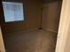 This bedroom has neutral paint and a window at 7885 W Flamingo Rd # 1064, Las Vegas, NV 89147