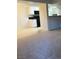 An open living space with a view into the kitchen at 7885 W Flamingo Rd # 1064, Las Vegas, NV 89147