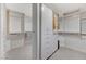 Spacious walk-in closet featuring custom built-ins, shelving, and ample storage space at 8121 Castle Pines Ave, Las Vegas, NV 89113