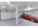 Spacious three car garage with ample space for parking and storage at 8121 Castle Pines Ave, Las Vegas, NV 89113