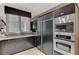 Contemporary kitchen featuring modern appliances, sleek countertops, and ample cabinet space at 8121 Castle Pines Ave, Las Vegas, NV 89113