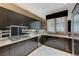 Modern kitchen featuring stainless steel appliances, sleek cabinets, and ample counter space at 8121 Castle Pines Ave, Las Vegas, NV 89113