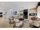 Comfortable living room with fireplace, plush seating, and neutral decor at 8121 Castle Pines Ave, Las Vegas, NV 89113
