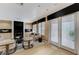 Bright living area showcasing stylish seating, natural light, and a seamless indoor-outdoor flow at 8121 Castle Pines Ave, Las Vegas, NV 89113