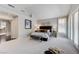 Relax in this airy main bedroom with vaulted ceiling, sitting area, and serene atmosphere, perfect for unwinding after a long day at 8121 Castle Pines Ave, Las Vegas, NV 89113