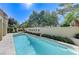 Beautiful backyard pool surrounded by lush greenery and offering a relaxing outdoor space at 8121 Castle Pines Ave, Las Vegas, NV 89113