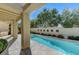 Beautiful pool area with covered patio, perfect for outdoor entertaining and relaxation at 8121 Castle Pines Ave, Las Vegas, NV 89113