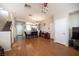 Inviting living room showcasing the staircase and a partial view of the kitchen at 8368 Creek Canyon Ave, Las Vegas, NV 89113