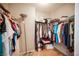 Spacious walk-in closet features ample hanging space and storage shelving throughout at 8368 Creek Canyon Ave, Las Vegas, NV 89113