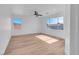 This bedroom offers a spacious area with natural light and a modern ceiling fan at 8725 Russet Hills Ct, Las Vegas, NV 89147