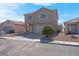 Charming two-story home showcasing a well-maintained front yard and inviting curb appeal at 8725 Russet Hills Ct, Las Vegas, NV 89147
