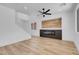 Large living room with fireplace feature and modern wood flooring at 8725 Russet Hills Ct, Las Vegas, NV 89147