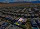 Aerial view of property outlined in blue in residential area at 880 Cirrus Cloud Ave, Las Vegas, NV 89138