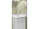 Bathroom featuring a modern white vanity, a mirror and a decorative towel ring at 880 Cirrus Cloud Ave, Las Vegas, NV 89138