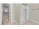 Bathroom featuring walk in shower and tile floors next to the closet at 880 Cirrus Cloud Ave, Las Vegas, NV 89138