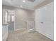 Upstairs hallway with neutral carpet, storage closets and white trim at 880 Cirrus Cloud Ave, Las Vegas, NV 89138