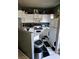 Functional kitchen featuring white appliances, cabinets, and black and white checkered floor at 9000 Las Vegas Blvd # 2061, Las Vegas, NV 89123