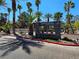 Community entrance with manicured landscaping, palm trees, and attractive Sedona on the Boulevard signage at 9000 Las Vegas Blvd # 2097, Las Vegas, NV 89123