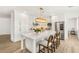 Bright kitchen featuring a large island, stainless steel appliances, and modern cabinetry at 9615 Sedona Hills Ct, Las Vegas, NV 89147