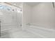 Clean bathroom featuring glass enclosed shower and separate soaking tub at 9742 Toad Hollow St, Las Vegas, NV 89141